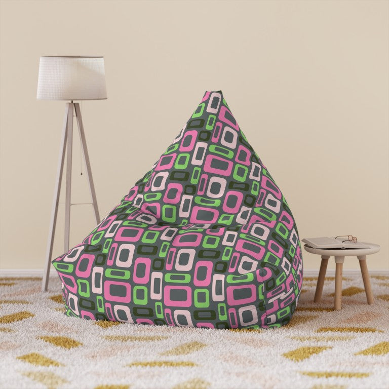 Geometric lounger cover in pop art pink and green shapes on black