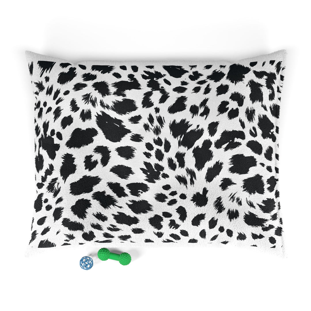 Personalized black and white leopard print dog bed with pet's name embroidered