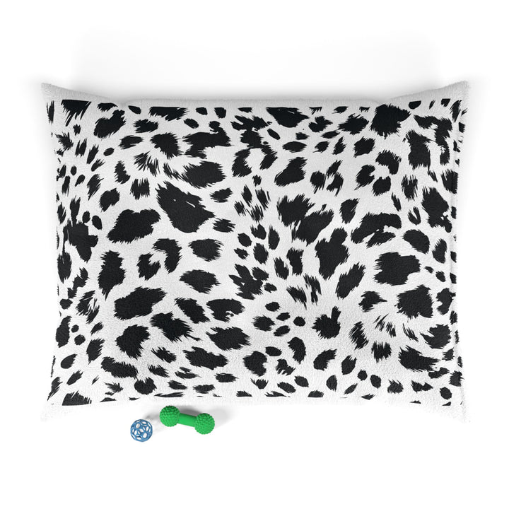 Personalized black and white leopard print dog bed with pet's name embroidered